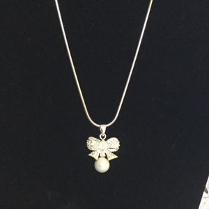 Going….Sterling Snake Bow Pearl Chain.